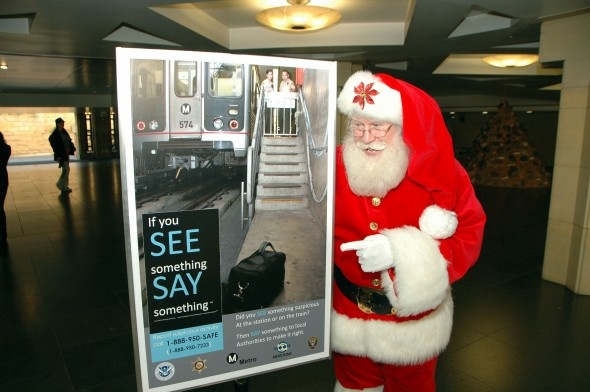 Santa promotes Metro safety at the free rides announcement on Thursday.