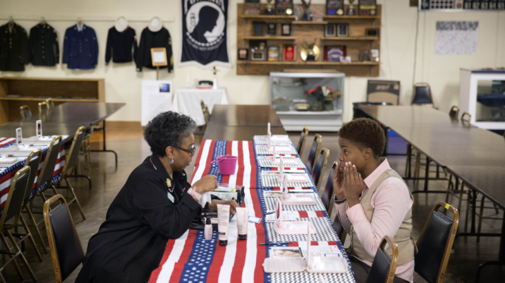 In November, U.S. employers added the most jobs to their payrolls in a year, according to payroll firm ADP. Here, Air Force Staff Sgt. Bri Smith, right, of Atlanta, talks with a Mary Kay consultant during a November job fair for veterans.