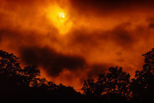 A forest fire obscures the sun during the Marble Cone Fire in Carmel Valley, California.