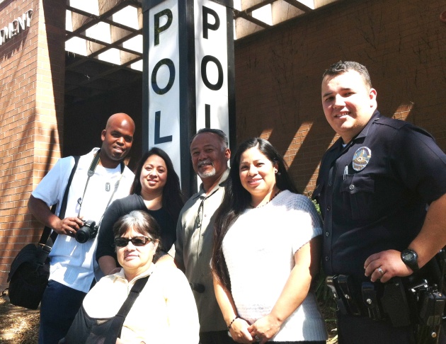 The Banks/Padilla/Mendoza family gathered at the Hollywood LAPD station after the dedication of the Miguel Leonard Padilla Banks soft room. L-R (standing) Darnell Banks, Xiomara Padilla-Banks, Miguel Padilla, Adriana and Jorge Mendoza; (sitting) Hilda Pad