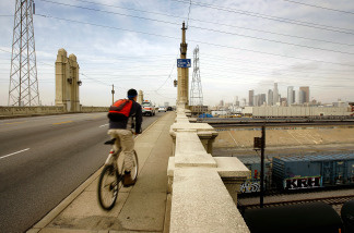 A bicyclist crosses the 4th Street Bridge over the Los Angeles River. File photo.