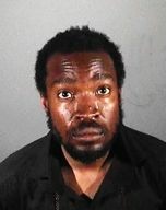 Courtney Anthony Robinson is considered to be a person of interest in the case of three homeless people who were stabbed as they slept.