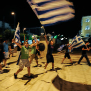 Greek supporters celebrate at the end of