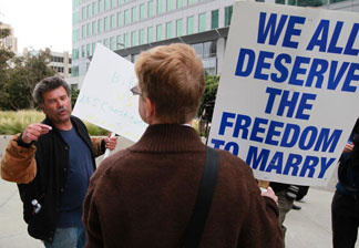 Prop 8 supporter Mark Wassberg (L) argues with Prop 8 opponent Ron Weaver as they waited to hear the ruling on Prop 8 outside of the Philip Burton Federal building August 4, 2010 in San Francisco, California.