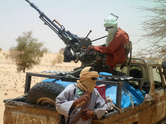 Islamist rebels of Ansar Dine near Timbuktu, in rebel-held northern Mali, during the release of a Swiss hostage on April 24.