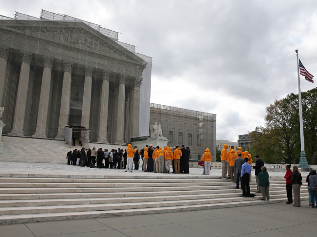 People line up to enter the United States Supreme Court Building last week.