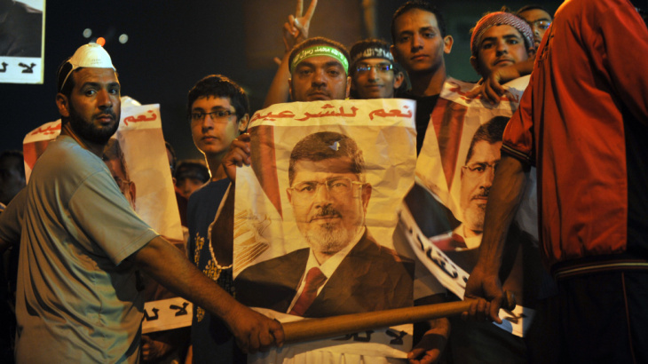 Egyptian supporters of ousted President Mohammed Morsi demonstrate against the military-backed government in Cairo. Morsi, who has been detained since July 3, is in good health, a European official says.