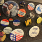 Close up of Patt Morrison's political button collection