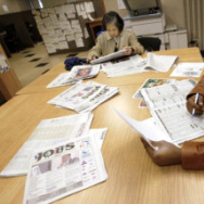 Unemployed workers search for jobs