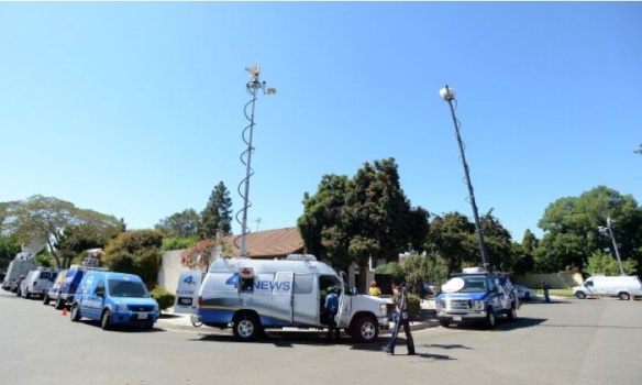 News vans outside alleged anti-Muslim filmmaker Nakula Basseley Nakula's home in Cerritos, CA