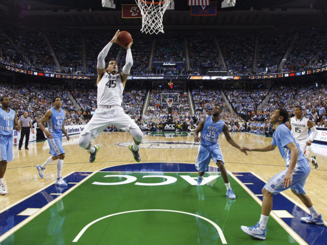 Julian Gamble of the Miami Hurricanes driving to the basket during his team's win Sunday over North Carolina. The 'Canes are ACC champions. Both teams will be in the NCAA tournament. Other teams have to wait to hear whether they'll be in the Big Dance.