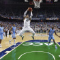 Julian Gamble of the Miami Hurricanes driving to the basket during his team's win Sunday over North Carolina. The 'Canes are ACC champions. Both teams will be in the NCAA tournament. Other teams have to wait to hear whether they'll be in the Big Dance.