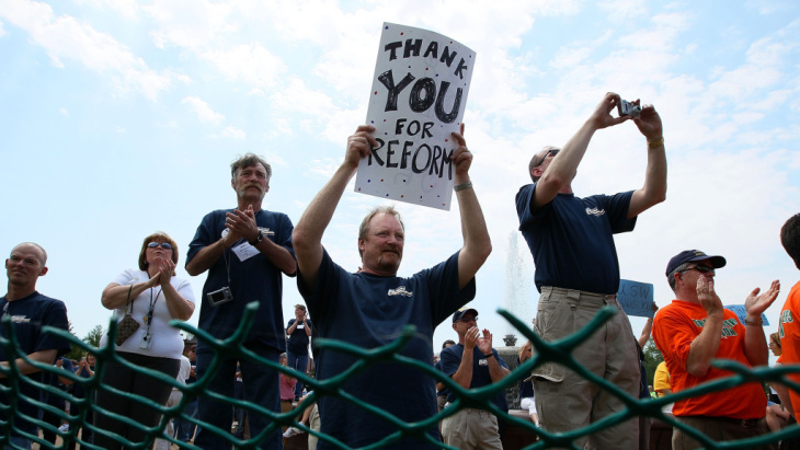 Union member Tom Stensberg holds a sign thanking Congress for the Affordable Care Act during a rally hosted by the AFL-CIO at the U.S. Capitol in May 2010.