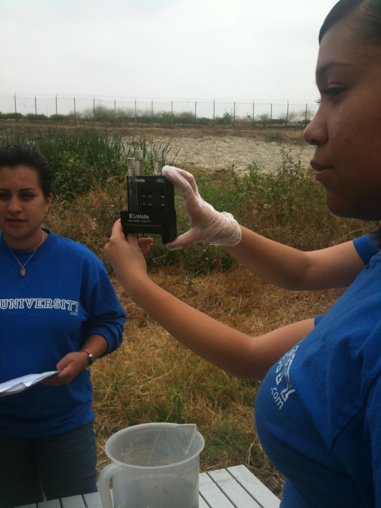 High schoolers in the water education program called Aqua University and ambassadors for the Conservation Corps at the L.A. River demonstrate water quality testing. EPA's announcement means the L.A. River must meet strict Clean Water Act standards.