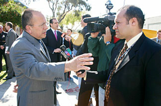 Councilman Ed Reyes talking to a television reporter about a northeast L.A. gang injunction on February 27, 2007.