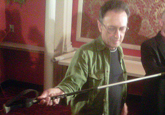 Edward Rosenthal shows off the walking stick he says helped save his life while he was lost in Joshua Tree National Park for six days without food or water.