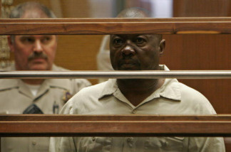Suspected killer Lonnie David Franklin Jr., dubbed the 'Grim Sleeper' for a 13-year break between his strings of 11 murders, is pictured during his arraignment in Los Angeles Criminal Courts on July 8, 2010.