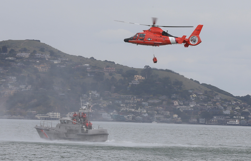 guard said one person died and five others were rescued their sailboat