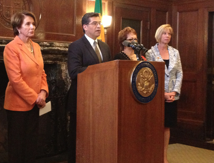 U.S. Rep. Xavier Becerra (D-Los Angeles) and House Minority Leader Nancy Pelosi, left, discuss their immigration strategy with reporters at Los Angeles City Hall, Friday, March 7, 2014. They and other House Democrats plan to file what's called a discharge petition in hopes of forcing a vote on a House immigration reform bill. But there may not be enough Republican support for the procedural move to work.