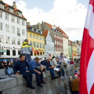 People enjoy the weather in the city of