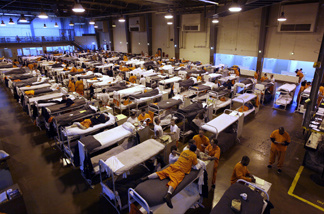 Several hundred inmates crowded the gymnasium at San Quentin prison in 2009.