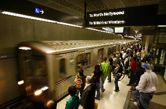 Passengers wait for Metrolink subway trains during rush hour June 3, 2008 in Los Angeles, California.