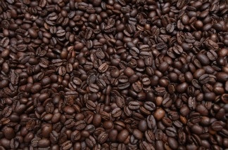 Freshly-roasted espresso coffee beans cool in a refurbished 1918 Probat coffee bean roaster.