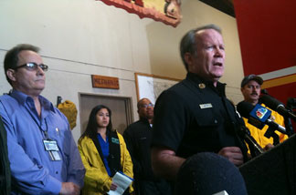 Deputy Chief Mike Metro, of the Los Angeles County Fire Department, addresses the media about potential mudslides in the areas denuded by last fall's Station Fire.