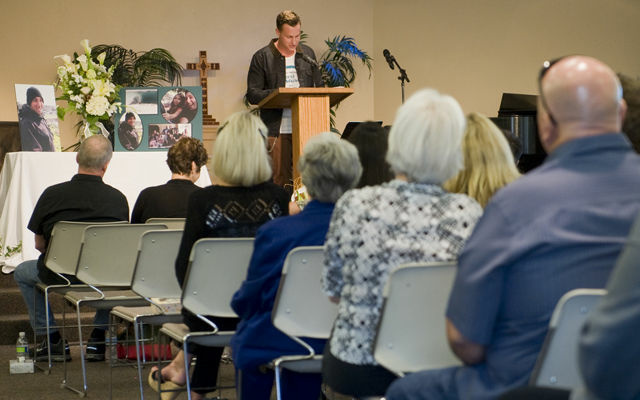 Friends and family attend a memorial for Joey Whynaught, who died April 5.
