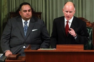 Gov. Jerry Brown delivers the state of the state address as Speaker of the Assembly John Perez (left) looks on at the California State Capitol on Jan. 31, 2011 in Sacramento.