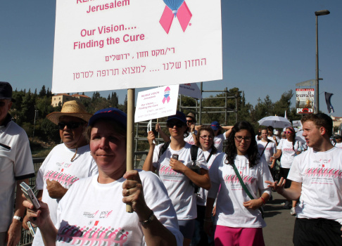 Israelis participate in a march organize