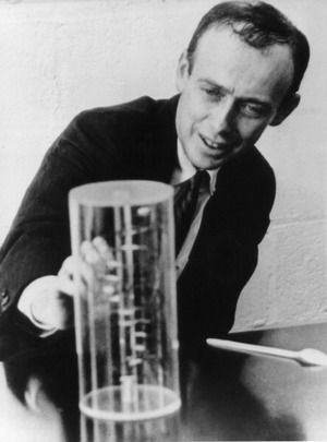 Dr. James Watson looks at a reproduction of the structure of DNA, which he helped discover, in this 1962 photograph. Decades later, Watson was one of the first people to have his entire genome sequenced.