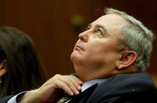 Former Bell City Manager Robert Rizzo listens to proceedings during his preliminary hearing on Wednesday, February 23, 2011 in Los Angeles Superior Court.