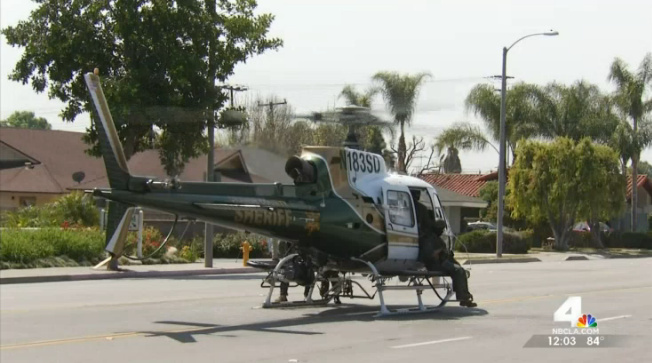 An Orange County Sheriff's Department helicopter helped look for a shooting suspect in Tustin Thursday.