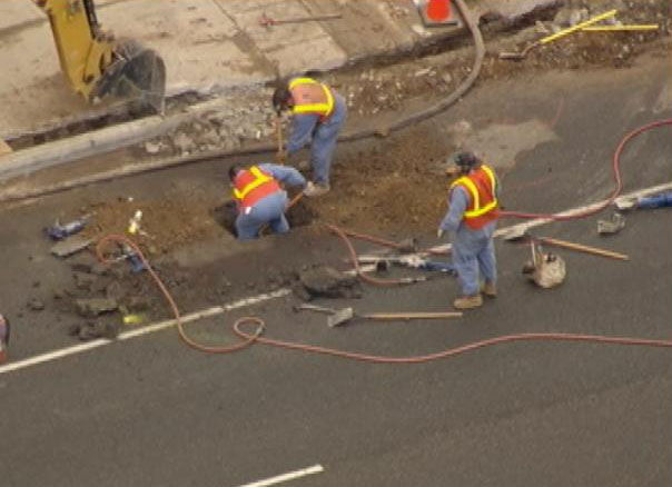 Workers repair a gas line leak in Malibu, Thursday, Nov. 8, 2012.