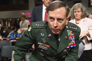 Gen. David Petraeus testifies before the Senate Armed Services Committee on Tuesday. The Senate confirmed him as President Obama's choice to take control of forces in Afghanistan.