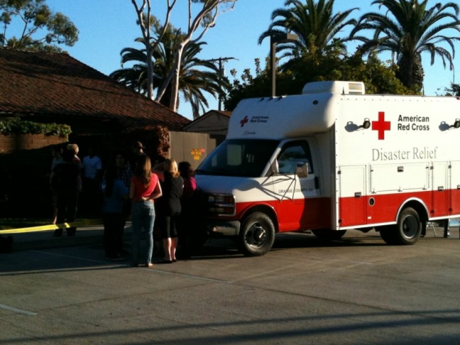 Trauma counseling in the parking lot of Seal Beach's public library.