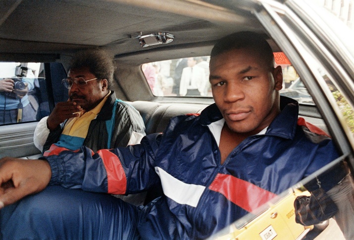 Heavyweight champion Mike Tyson (R) and