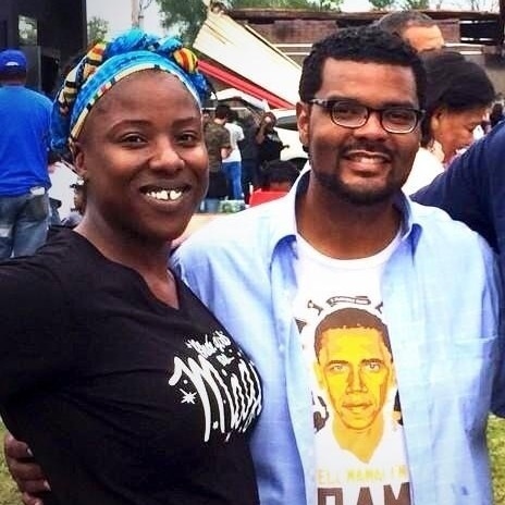Tiffany Flowers and Alderman Antonio French in front of Quik Trip in Ferguson, MO.