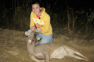 Magan Hebert, 15, poses with the young buck, or "spike," that she shot in Waynesboro, Miss., in November. Magan has been hunting since she was in the fourth grade.