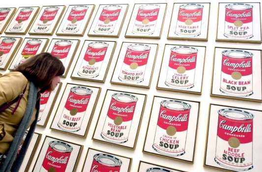A visitor looks at enigmatic American artist Andy