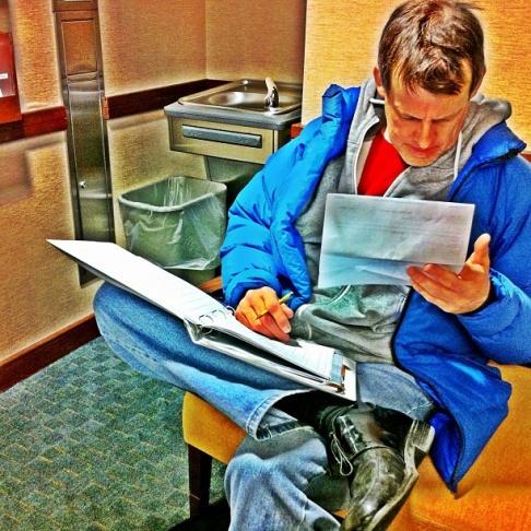 Mayo encourages transplant patients to keep meticulous records of BP, blood levels, prescriptions, etc. James Rabe is updating his records while he waits for a check-up.