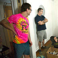 Journalist David Farrier, left, and filmmaker Dylan Reeve, center, got more than they expected when they set out to make "Tickled," a documentary about the world of competitive endurance tickling.