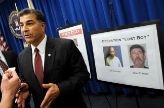 Steven Martinez, Assistant Director of the FBI in Los Angeles, speaks to reporters on Dec. 14, 2010 in Los Angeles during a press conference after the 'Lost Boy' international child pornography ring was dismantled.