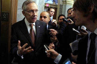 U.S. Senate Majority Leader Sen. Harry Reid (D-NV) is surrounded by members of the media after a news conference Feb. 3, 2011 on Capitol Hill in Washington, DC. Senate Democrats held a news conference to urge the Republicans to drop their threats on pushing policies that would shut down the government.