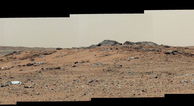 This scene combines seven images from the telephoto-lens camera on NASA's Mars rover Curiosity. The images were taken July 24, 2013.