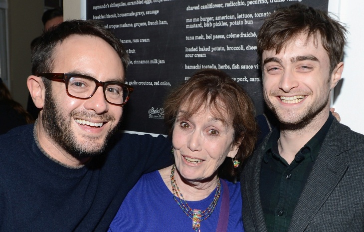Director John Krokidas, Roberta Danza and actor Daniel Radcliffe at press dinner for the film "Kill Your Darlings" in Park City, Utah.