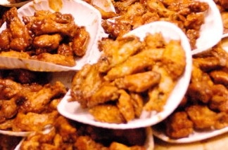 File photo: According to a new study, the average American eats about 185 pounds of chicken, turkey, pork and beef.