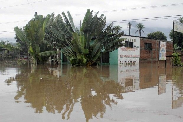 View of a flooded road in Ciudad Arce, El Salvador, October 16, 2011