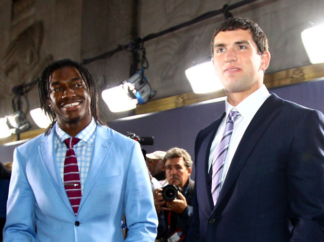 After the lights turn elsewhere, former NFL player Nate Jackson warns top draft picks Robert Griffin III, left, and Andrew Luck that their every breath will be a public affair.